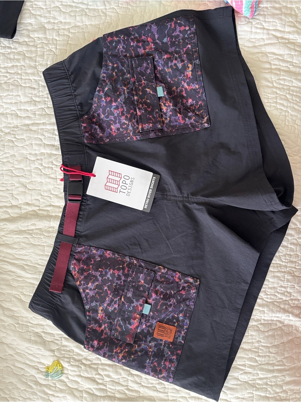 Topo Designs Black Athletic Shorts with Maroon & Purple Accent Pockets
